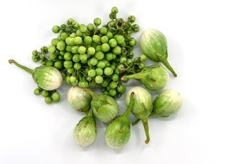 Group of fresh Thai eggplant and Turkey berry together on white background, top view image.