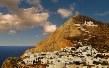 Panoramic view at sunset of the spectacular Chora of the Greek island of Folegandros in the...