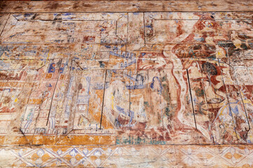 The Ancient painting of buddhist temple mural at Wat Phra That Lampang Luang, a famous temple in lampang province, Thailand. The temple is open to the public and has beautiful murals on the walls.