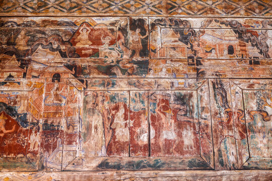 The Ancient painting of buddhist temple mural at Wat Phra That Lampang Luang, a famous temple in lampang province, Thailand. The temple is open to the public and has beautiful murals on the walls.