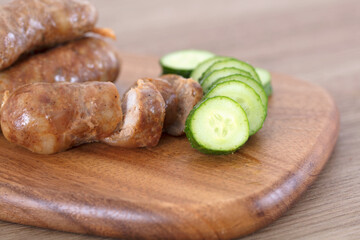 Sliced sausage and sliced cucumber