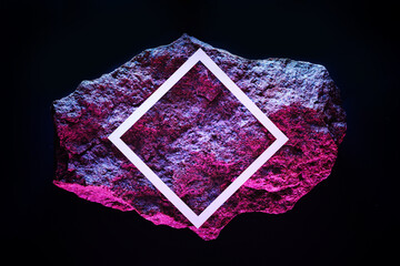 Red meteorite in dark space with white frame and copy space neon lighting.