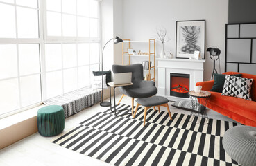 Stylish interior of modern living room with fireplace