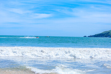 Fishing boats on sandy beach in Chlopy village port