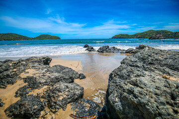Fototapeta na wymiar beach for the next big wave, Coastal Wave, rocks and blue sky