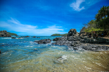 Beautiful beach at famous beach, rock, sun, water and island