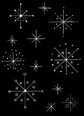 Graphic black background with a white pattern of stars.