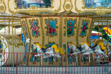 Children's carousel with horses