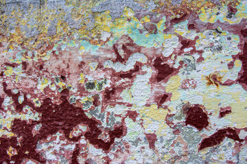 multicolored texture of the wall with a dominant burgundy color use for background