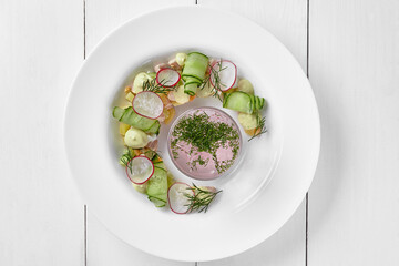 Top view of ingredients for okroshka with mineral water