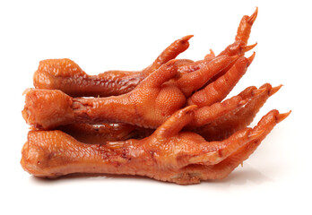 Cooking chicken feet on white background