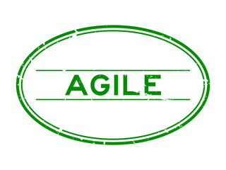 Grunge green agile word oval rubber seal stamp on white background