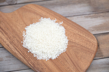 Scattered rice on cutting board