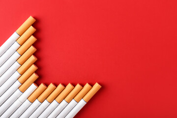 Many cigarettes on color background
