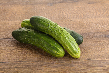 Fersh juicy green cucumbers heap