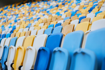 Football or soccer stadium row of seats. Chairs on football stadium