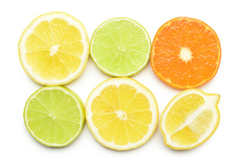 Healthy citrus fruit slices on white background