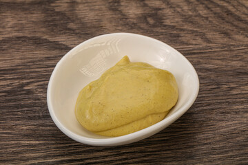 Dijon mustard sauce in the bowl