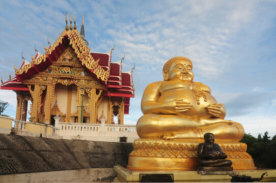 Golden Sitting Buddha Statue (Katyayana) at Wat Pa Phu Hai Long