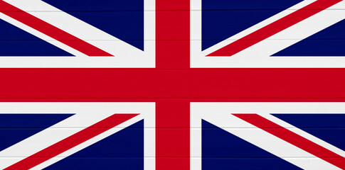 British flag on wooden textured background. Copy space. Banner. Wood finish material shop concept. National holiday. Painted plank timber surface. Horizontal lines. Independence day. Memorial day