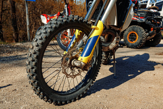 The front wheel of motocross close up