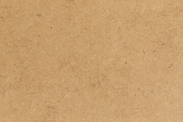 Pressed beige chipboard texture.