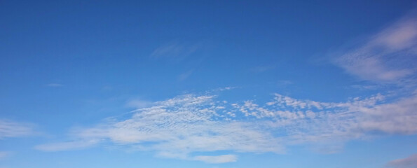 Naklejka na ściany i meble white clod shape blue sky abstract nature background