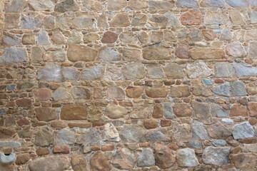 Architecture textures, detailed and rustic of paired masonry granite, traditional spanish granite wall