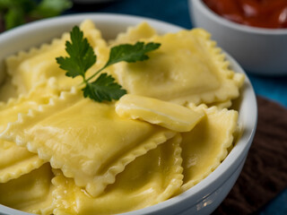 Ravioli in a white bowl with a sprig of green parsley on top. Close-up. Careful viewing. Macro photography. There are no people in the photo. Color image.