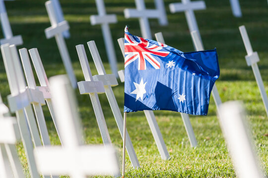 An Australian flag amongst a group of crosses