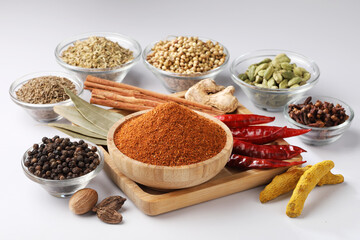 Indian garam masala powder and whole ingredients spices for curry