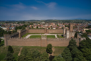 Fototapeta na wymiar Aerial view of the Italian historic castle Castello Scaligero, view of the Villafranca di Verona. Historical part of the city Villafranca di Verona, Verona, Italy.