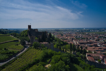 Fototapeta na wymiar Soave castle aerial view, province of Verona, Italy. Aerial panorama of Italy castles.