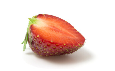 Isolated half of strawberry on a white background.