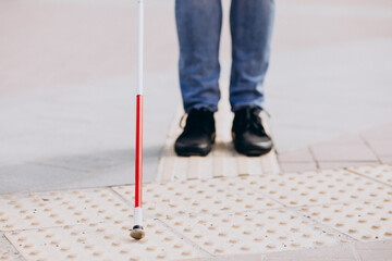 Feet close up,blinded man with walking stick