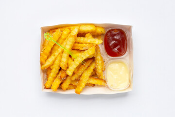 French fries in paper box on white background.