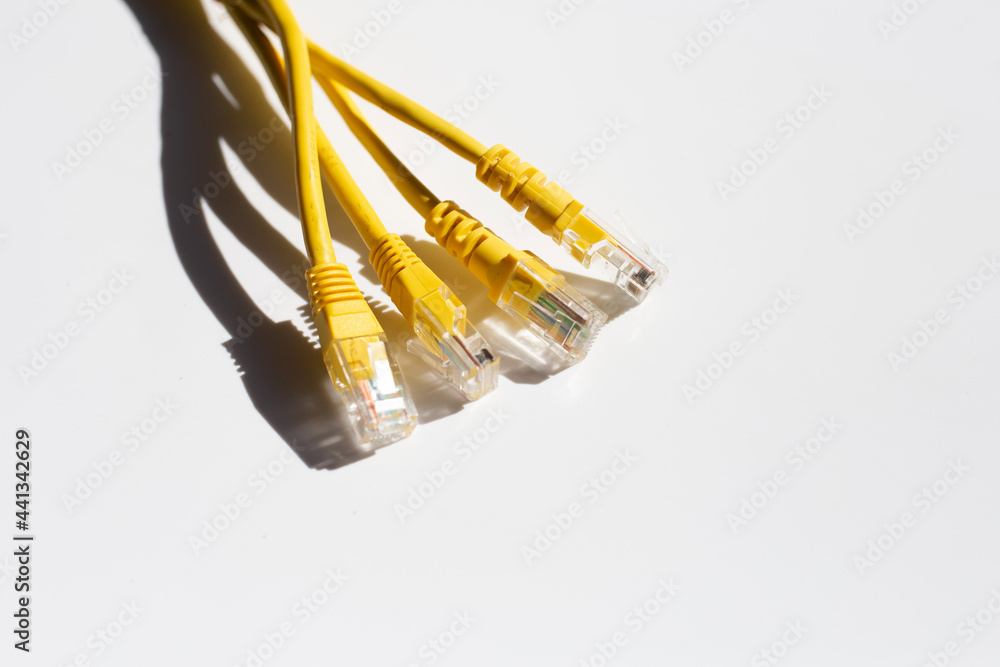 Wall mural lan network connection ethernet yellow cables on white