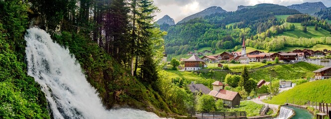 Waterfall in jaun in alps mountain. kanton Fribourg, Freiburg nearby Bulle, Bern, Thun. Good hiking tourist way. Switzerland