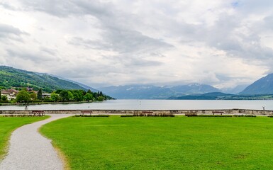 Amazing postcard view on Thun Lake (Thunersee, Thuner See), alps mountains. Thun, Switzerland.