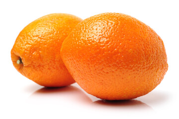 Whole orange fruit and his segments or cantles isolated on white background cutout