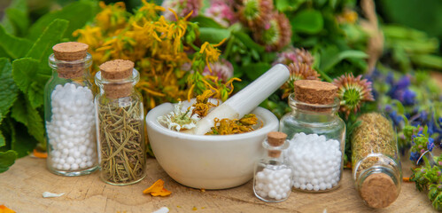 Tincture of medicinal herbs in bottles. Selective focus.