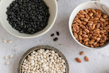 Variety of legumes in glass jars. Healthy eating ingredients, natural protein food