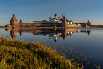 View of the Solovetsky Monastery from the side of the Holy Lake on a sunny cloudless morning, Solovetsky Island, Arkhangelsk region, Russia
