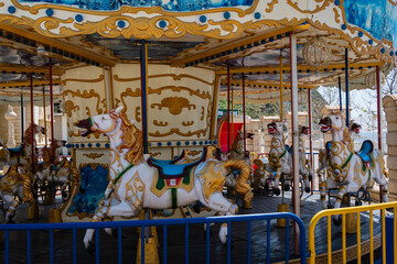 Amusement park on Black Sea embankment in Arkhipo-Osipovka. Children's carousel with colorful...