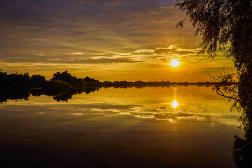 Fototapeta na wymiar Beautiful landscape with sunset in the Danube Delta, Romania
