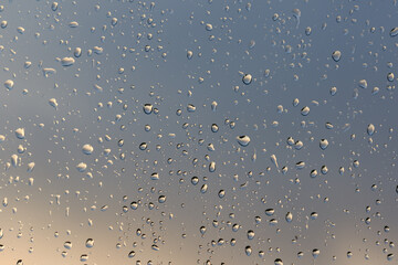water droplets raindrops on a window