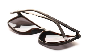 Modern stylish black sunglasses with polarized lenses isolated on white background