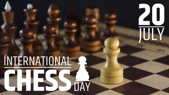 Chess game. White and black pieces on chess board. International chess day 20 july