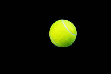 tennis ball isolated on black