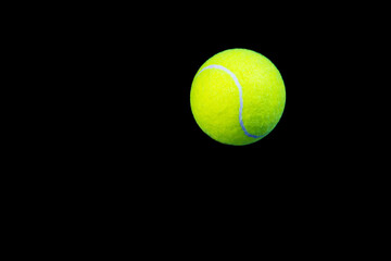 tennis ball isolated on black
